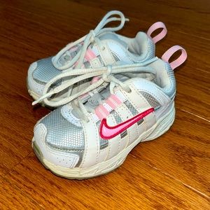 Nike pink and white baby shoes